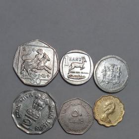 6 иностранных монет нестандартной формы (некруглые). Набором . Оригинал